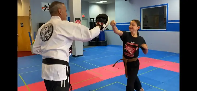Fitness Kickboxing athletes practicing in class at Inner Dragon Martial Arts in Hudson NH