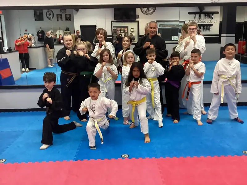 Inner Dragon Martial Arts students and instructors posing together after class